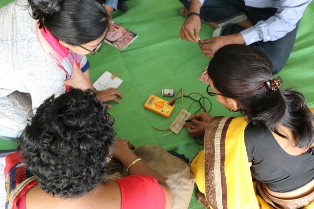Resource person Tuba helping out the teachers